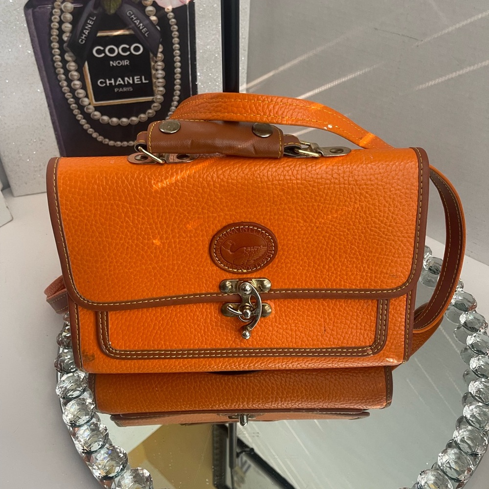Carina Int’l inc. water proof orange leather bag